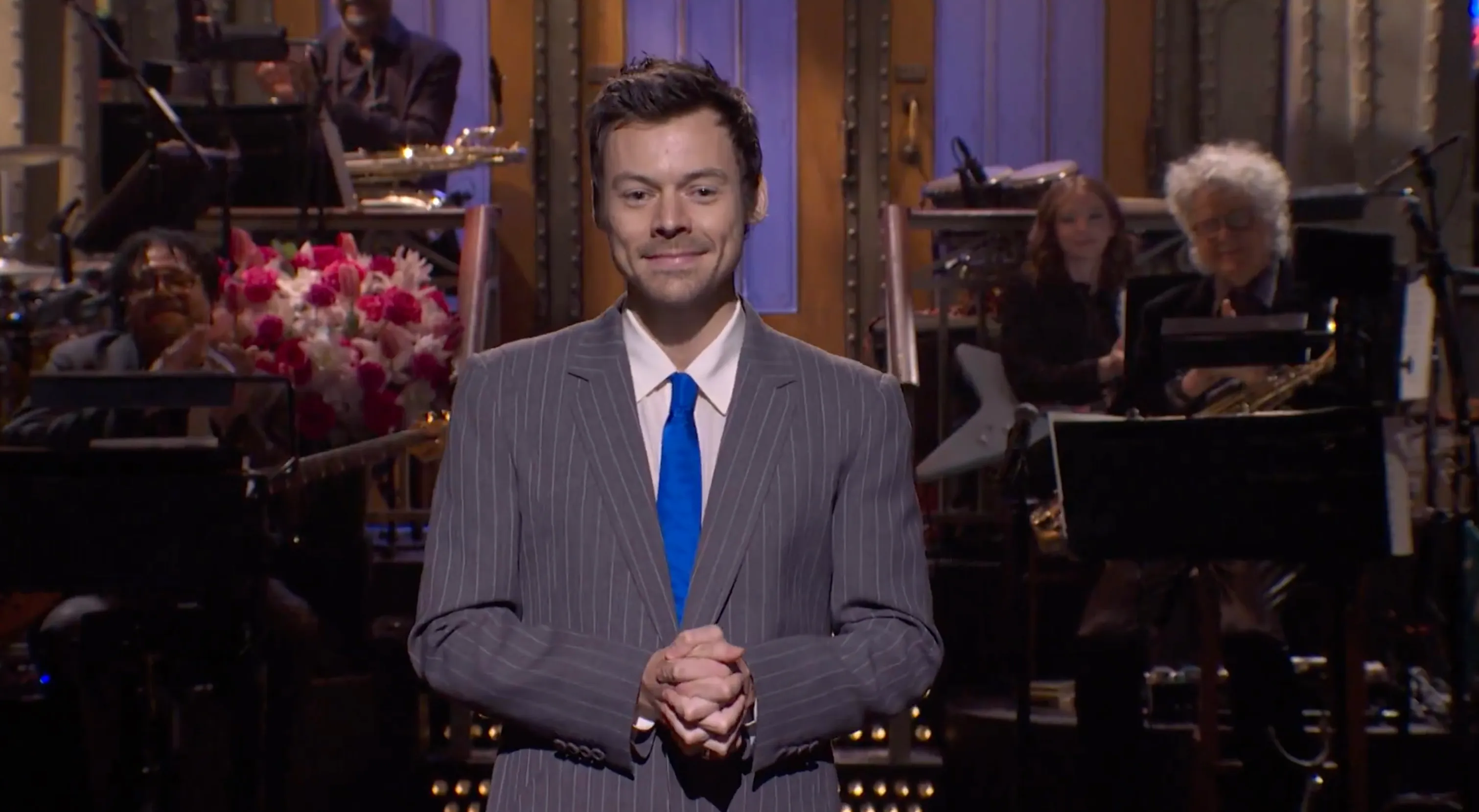 Harry Styles hits back at &lsquo;queerbaiting&rsquo; claims &mdash; by kissing male comedian during &lsquo;SNL&rsquo; monologue