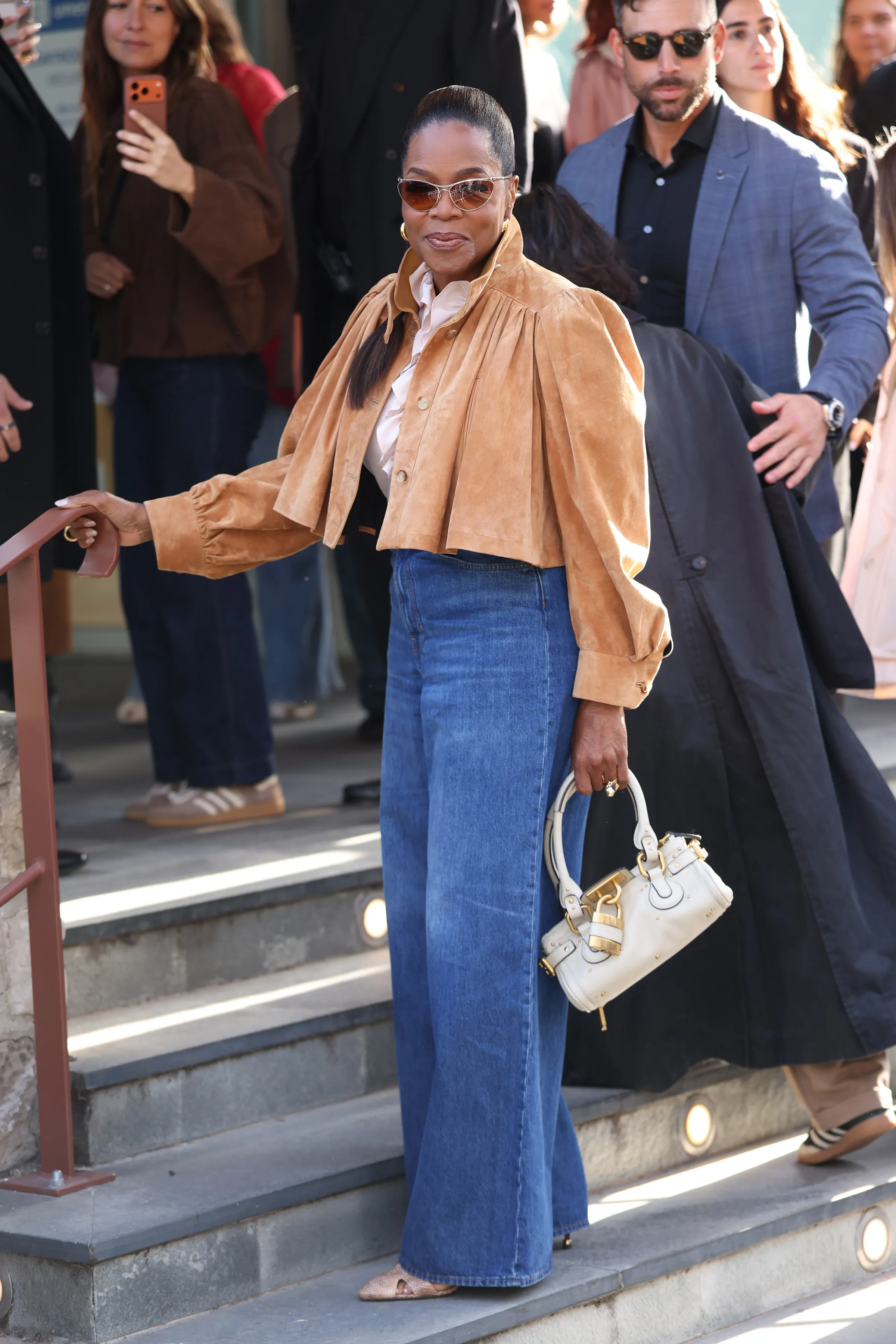 Oprah Winfrey claps back at haters after she&rsquo;s trolled for &lsquo;90-year-old walk&rsquo; at Paris Fashion week