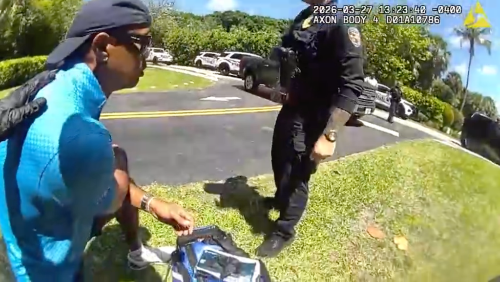 Newly-released Tiger Woods bodycam footage shows golfer crouching on side of road after DUI crash