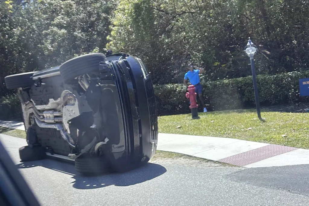 Newly-released Tiger Woods bodycam footage shows golfer crouching on side of road after DUI crash