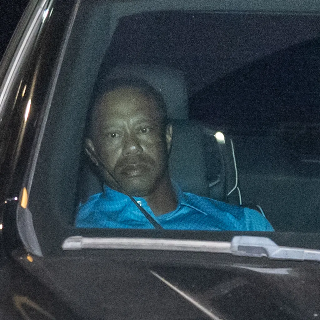 Newly-released Tiger Woods bodycam footage shows golfer crouching on side of road after DUI crash