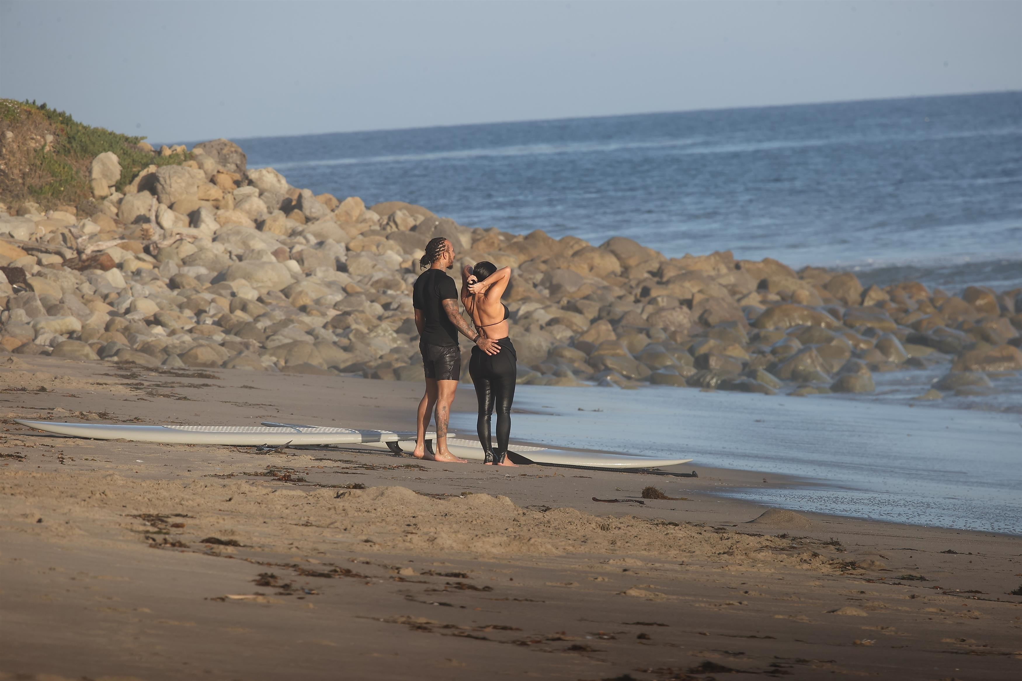 Lewis Hamilton gets handsy with Kim Kardashian in PDA-packed beach date