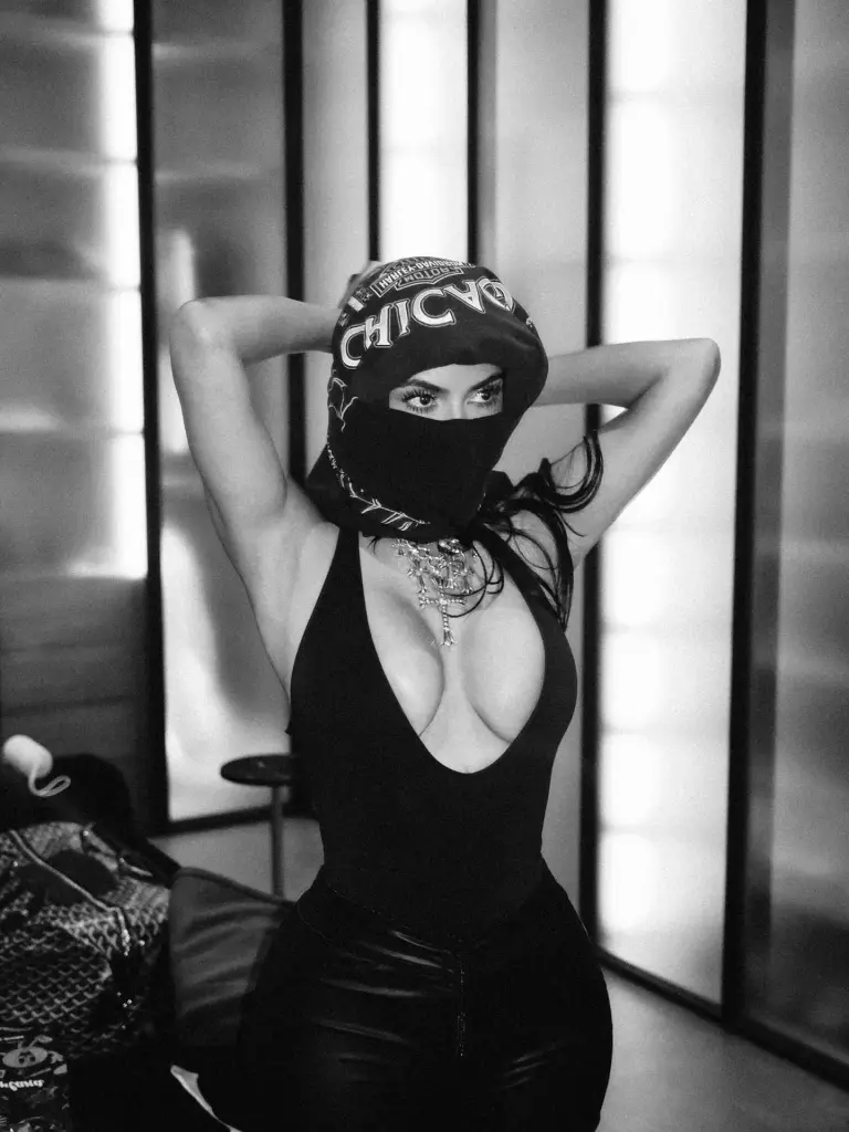 Kim Kardashian sneaks Lewis Hamilton PDA moment into sultry Coachella roundup