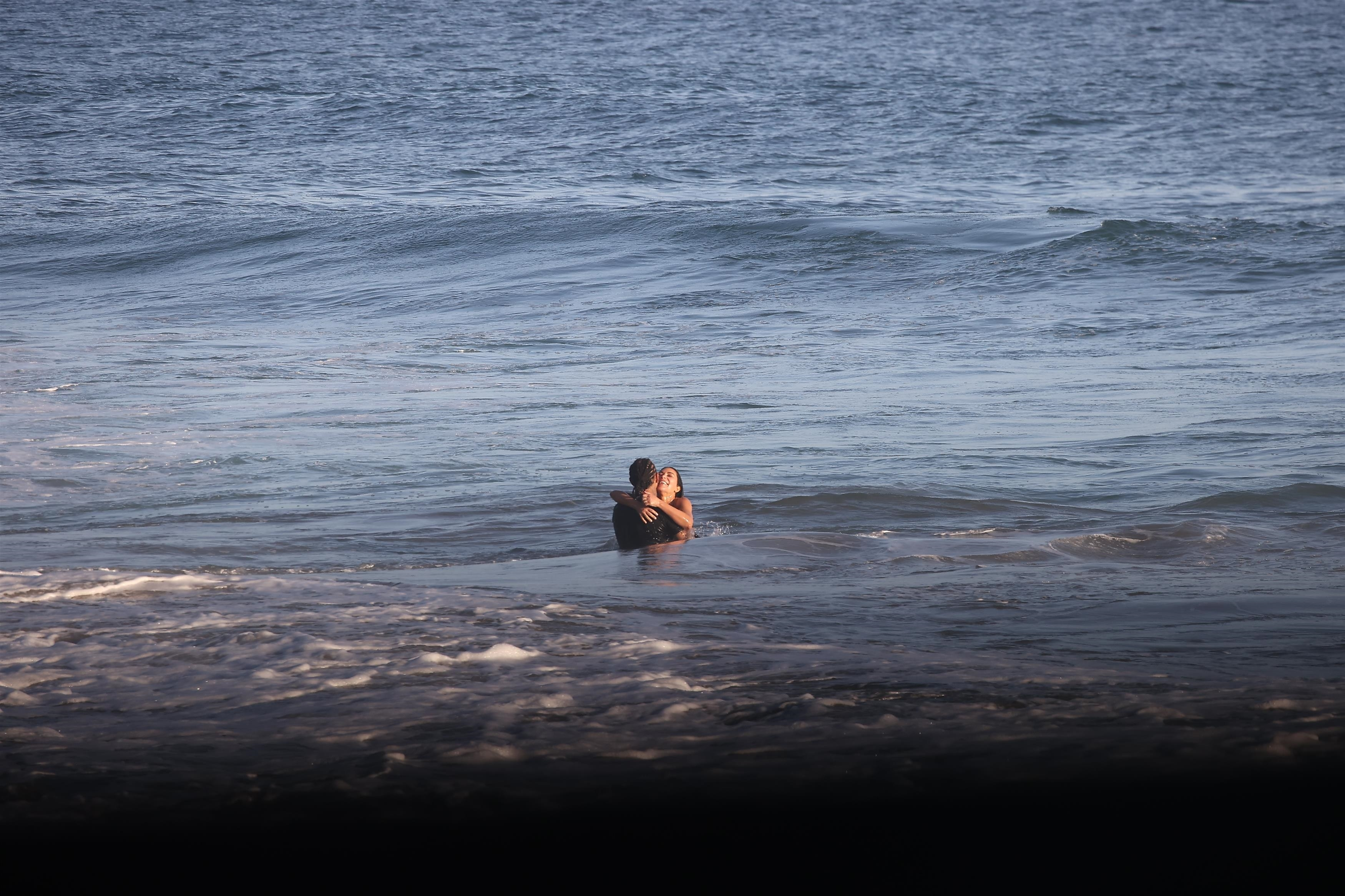 Lewis Hamilton gets handsy with Kim Kardashian in PDA-packed beach date