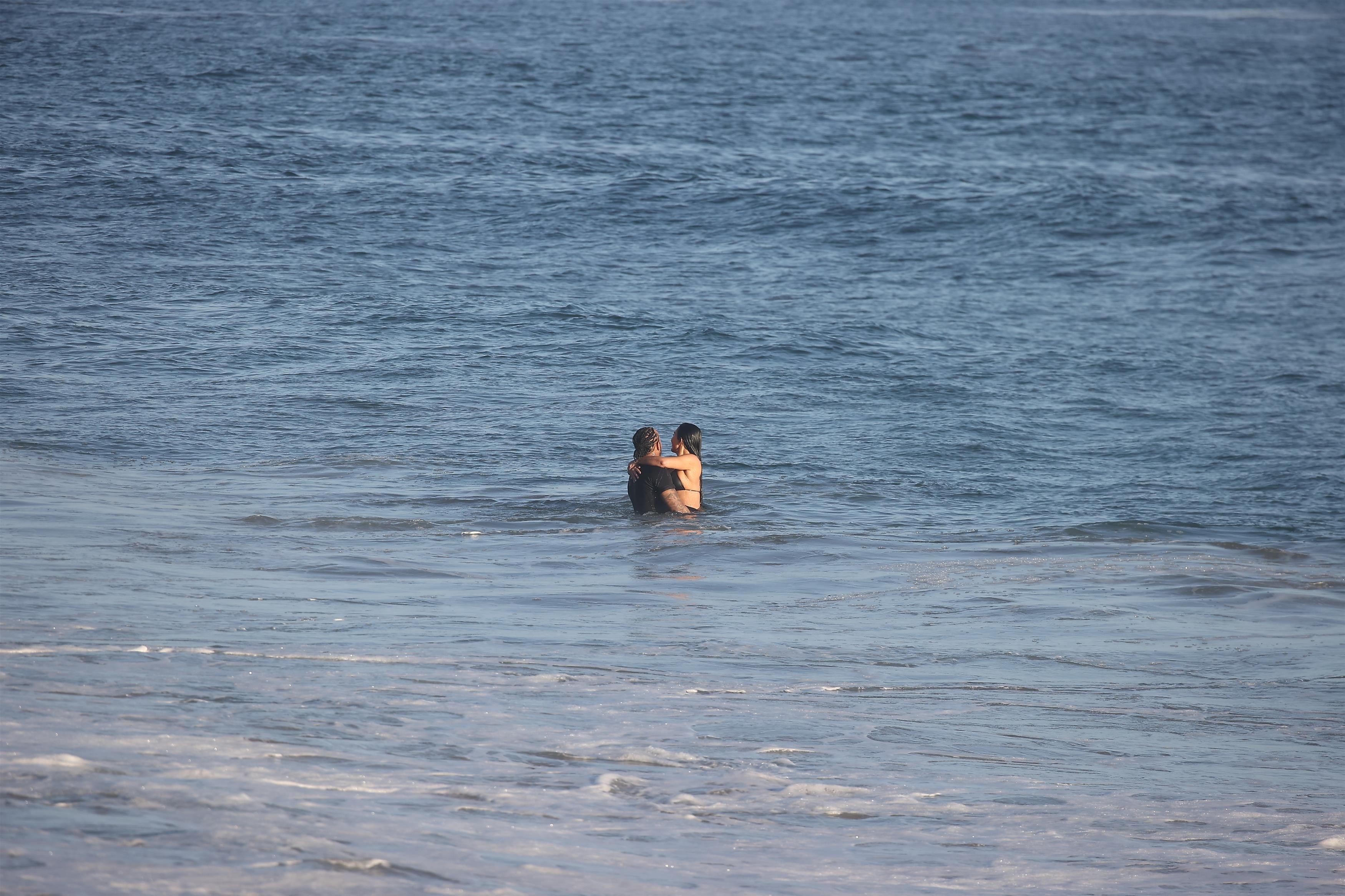 Lewis Hamilton gets handsy with Kim Kardashian in PDA-packed beach date