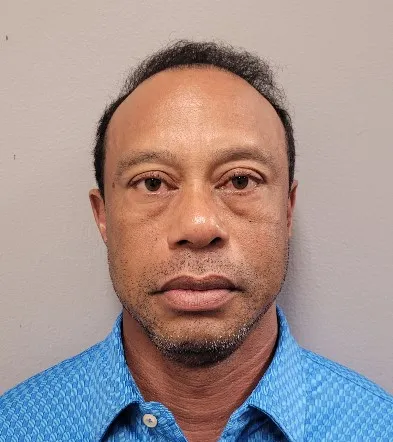 Newly-released Tiger Woods bodycam footage shows golfer crouching on side of road after DUI crash