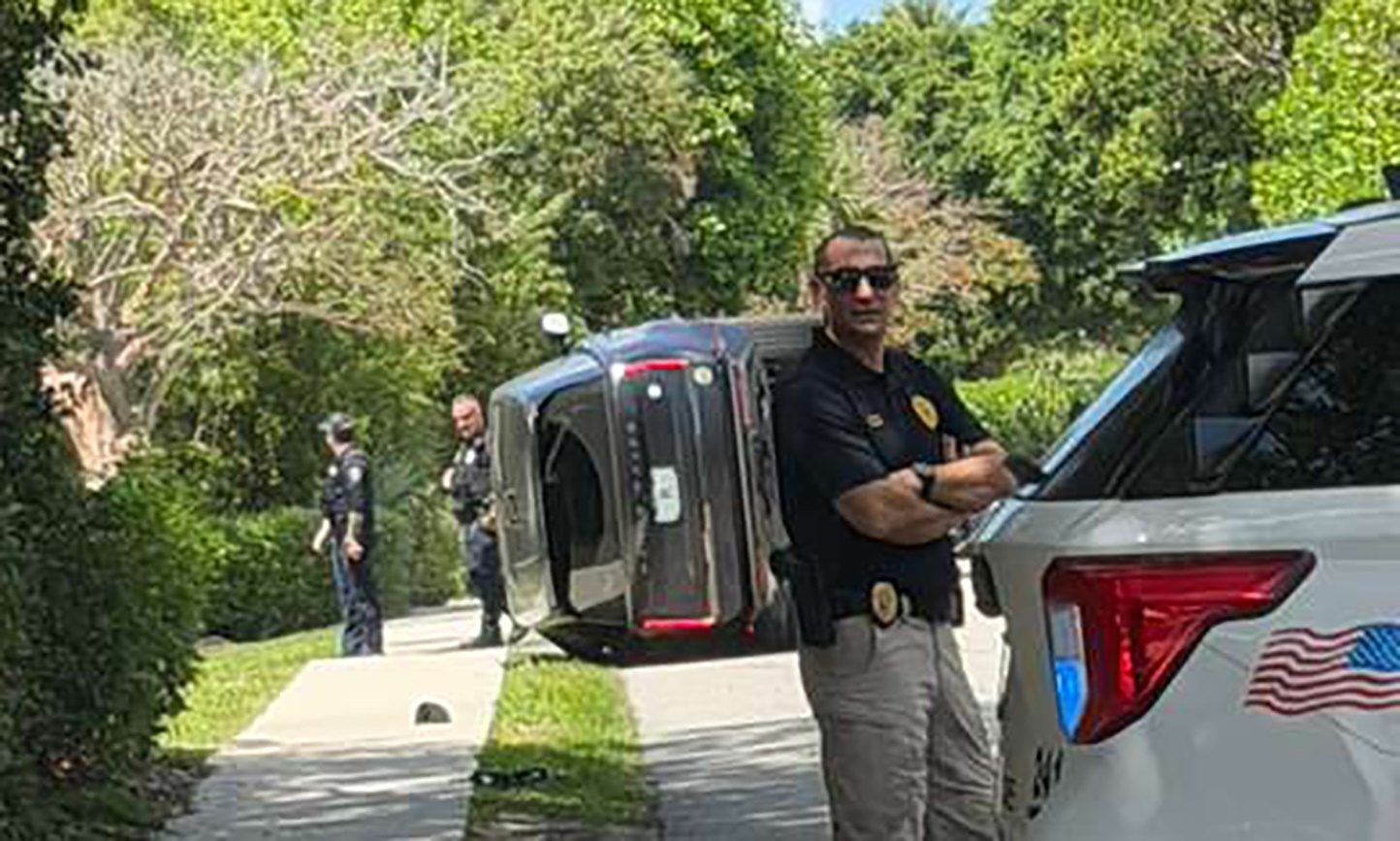 Newly-released Tiger Woods bodycam footage shows golfer crouching on side of road after DUI crash
