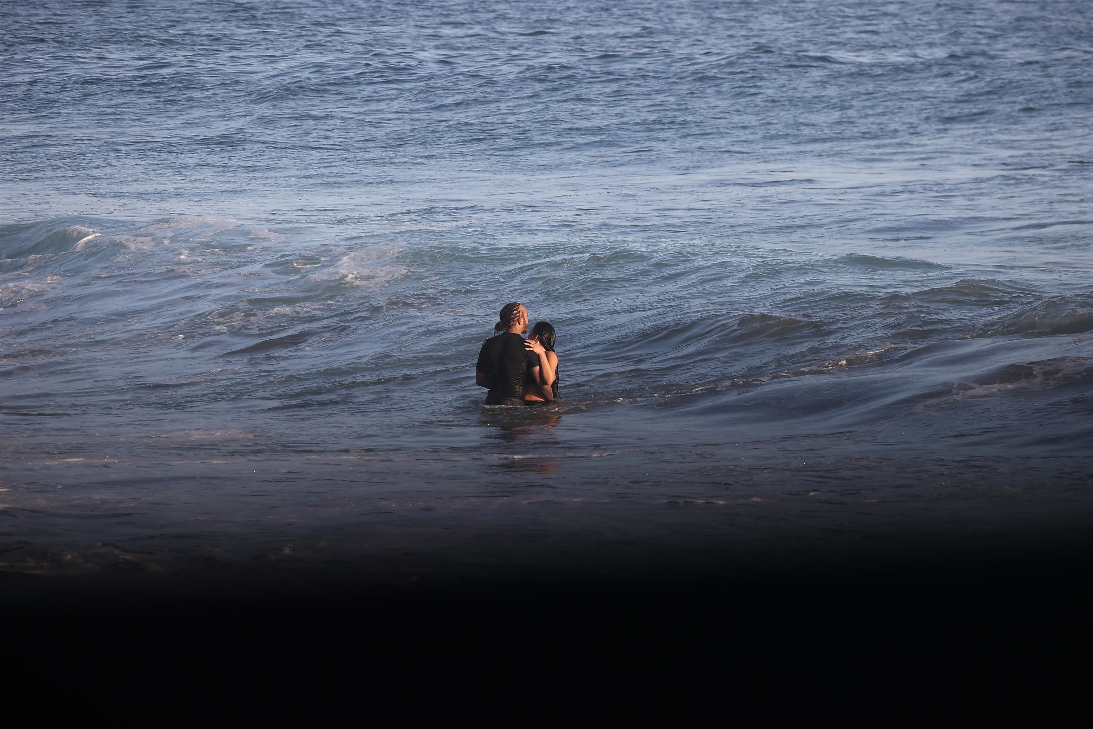Lewis Hamilton gets handsy with Kim Kardashian in PDA-packed beach date