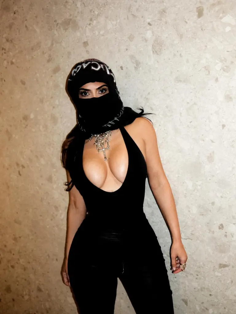 Kim Kardashian sneaks Lewis Hamilton PDA moment into sultry Coachella roundup