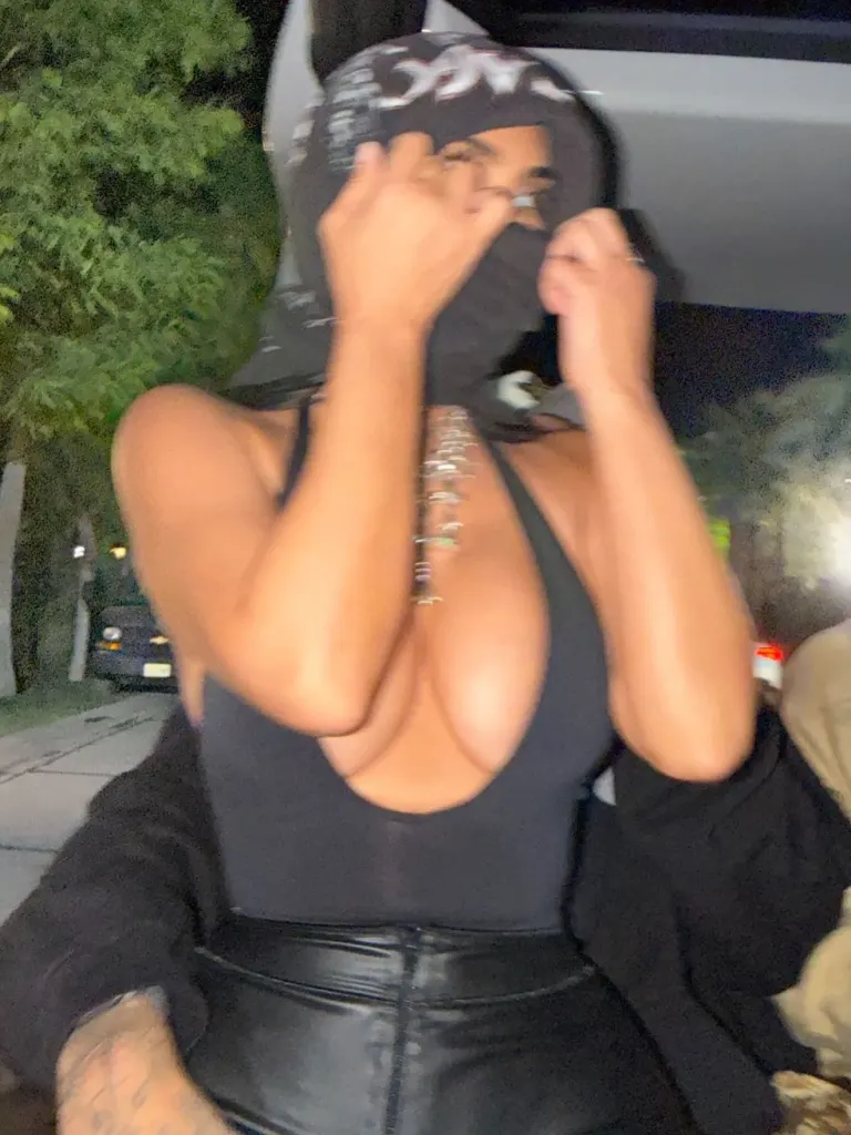 Kim Kardashian sneaks Lewis Hamilton PDA moment into sultry Coachella roundup