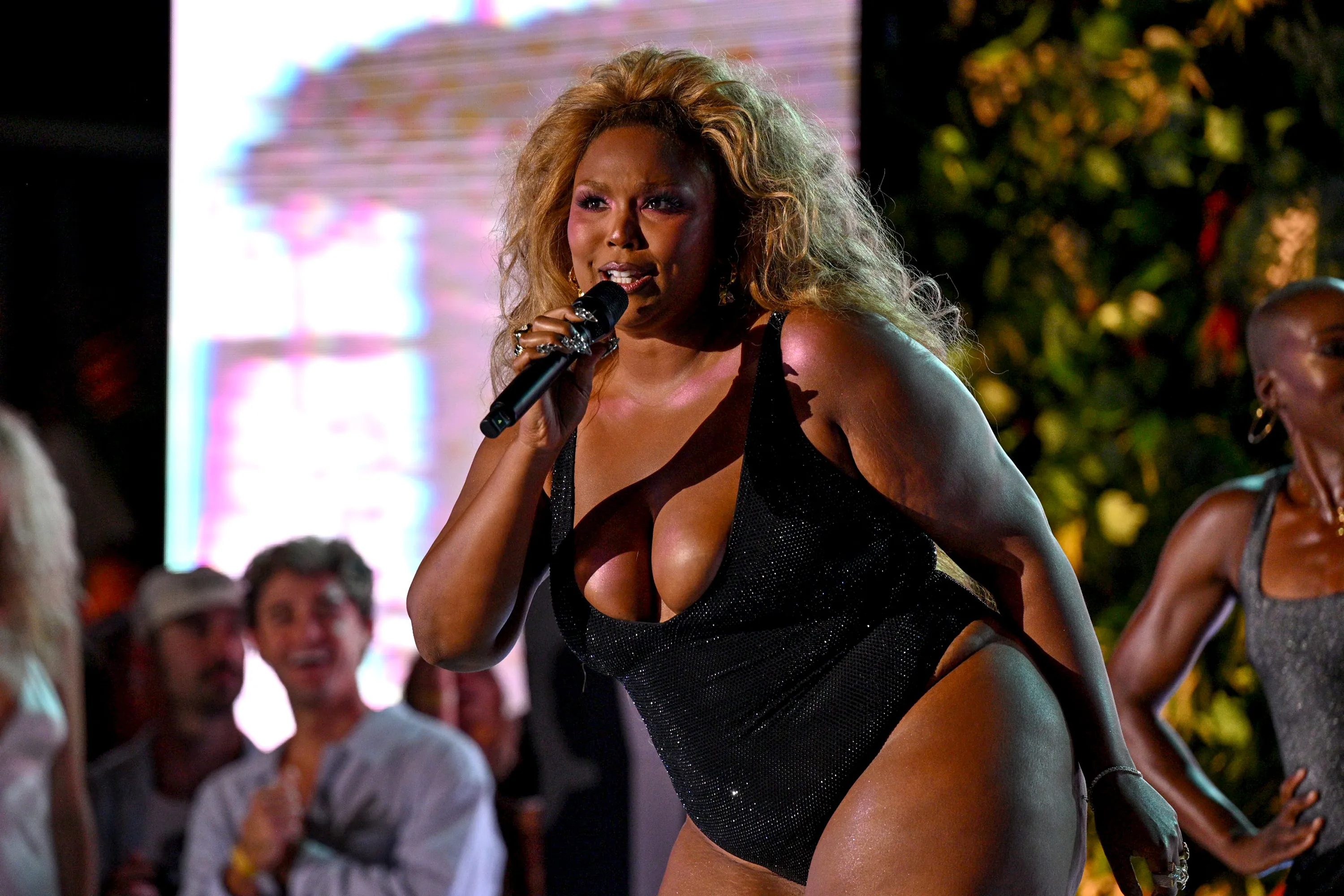 Lizzo spills wild secret from Sports Illustrated Swimsuit show performance: ‘People were slipping and eating s–t’
